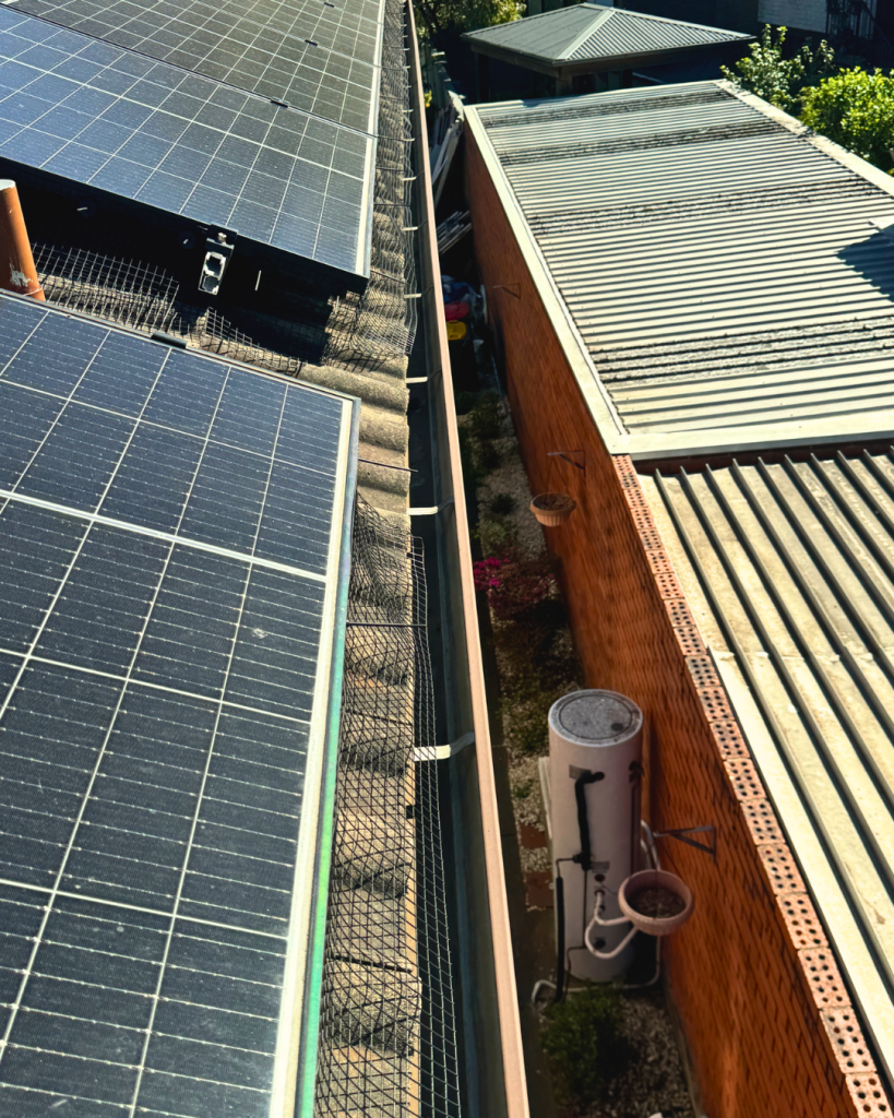 Mesh blocks debris from entering under solar panels