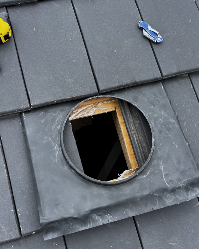 Whirlybird base plate aligned over roof opening