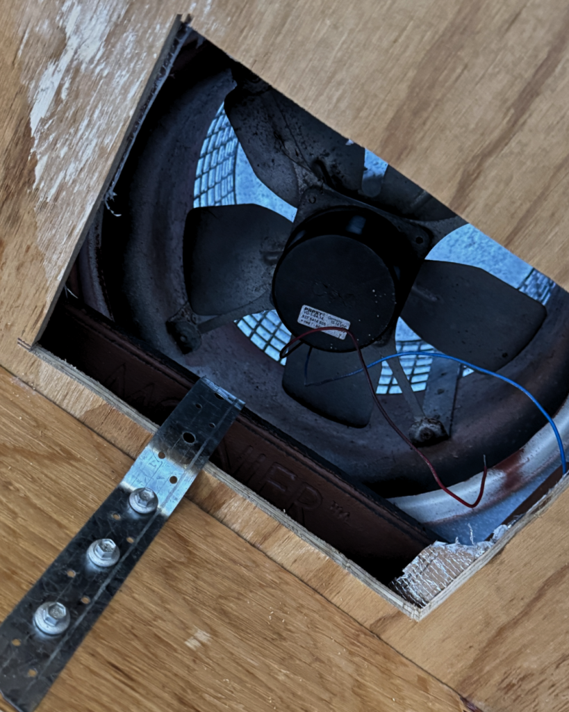 Internal fan seen from roof cutout during installation